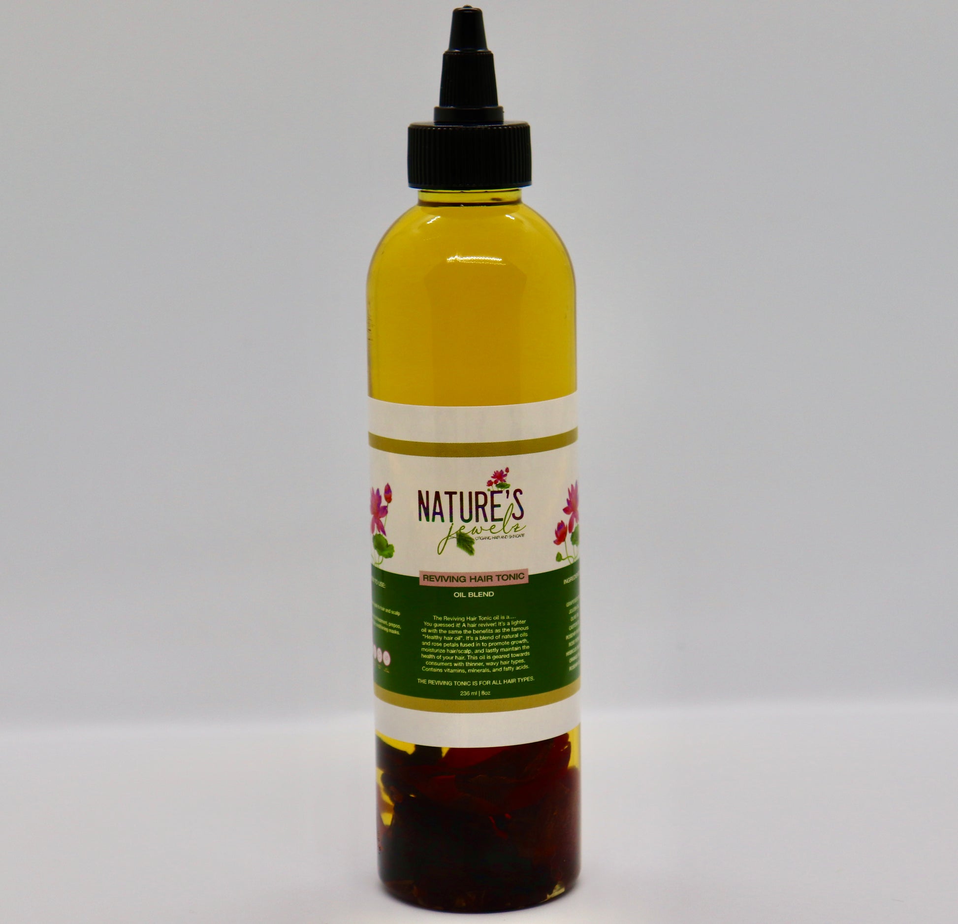 Nature's jewelz replenishing herbal hair tonic side view